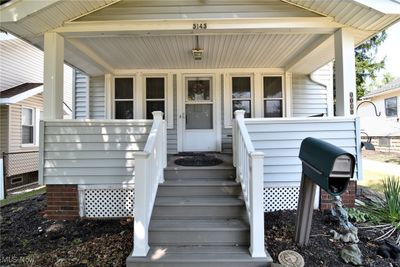 Doorway to property with covered porch | Image 2