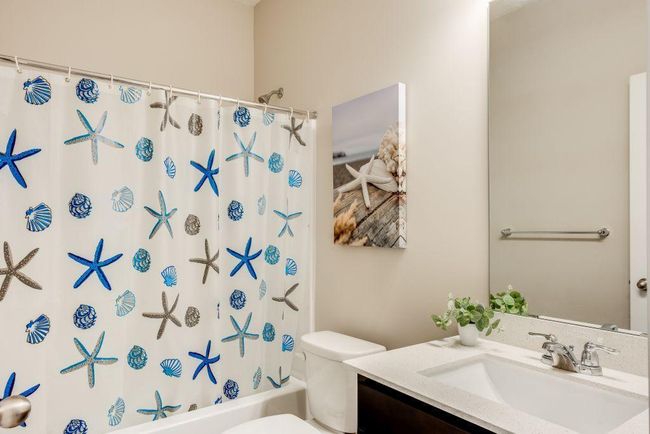 The second bathroom is also located on the main floor between bedrooms 2 & 3 | Image 14