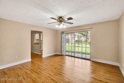 Living room looking into dining/ kitchen | Image 2