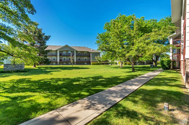 Surrounding community featuring a yard | Image 17