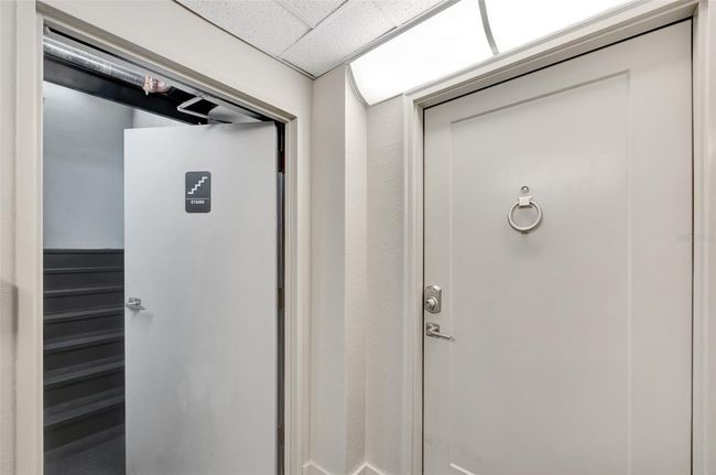 Right outside your door is a stairwell that leads downstairs for convenience | Image 22