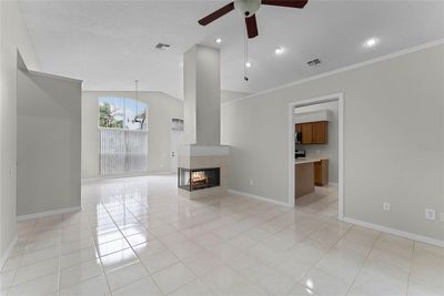 Living room & dining with wood burning fireplace | Image 3