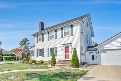 Colonial-style house with a front yard | Image 3