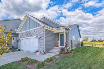 1404 Zennor Court, House other with 2 bedrooms, 2 bathrooms and null parking in Raymore MO | Image 1