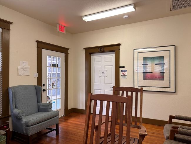 Dining area featuring dark wood finished floors | Image 9