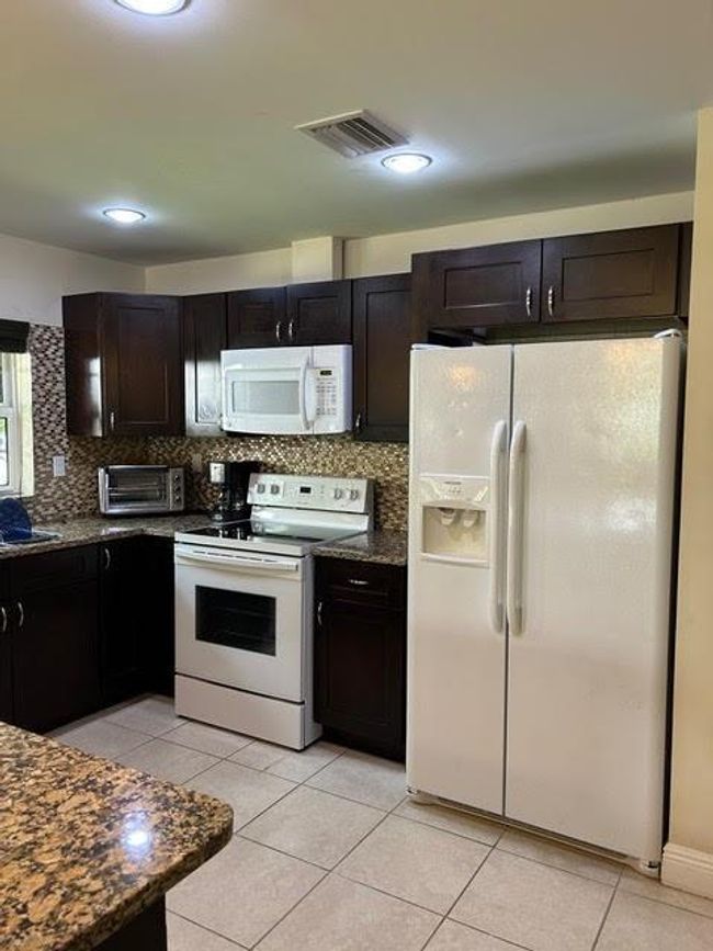 1473 Ne 48 Th St, House other with 3 bedrooms, 2 bathrooms and null parking in Pompano Beach FL | Image 30