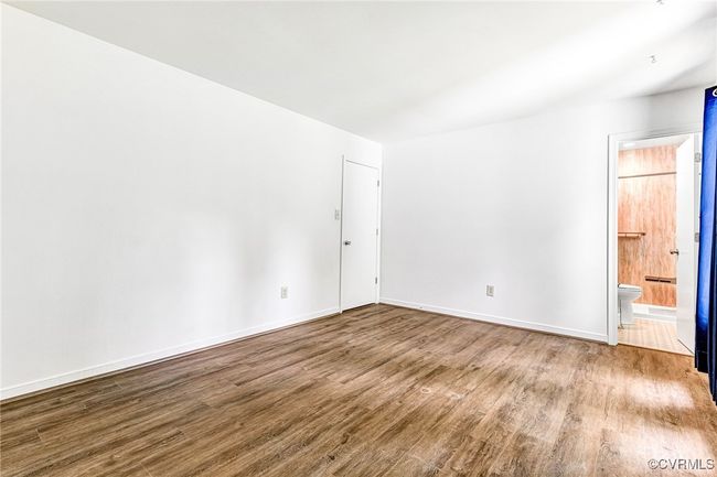 Unfurnished room featuring wood finished floors | Image 12
