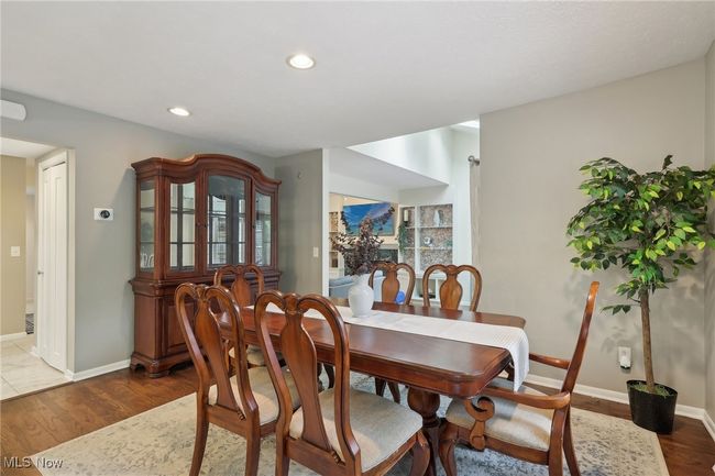 Dining area featuring recessed lighting, wood finished floors, and baseboards | Image 13