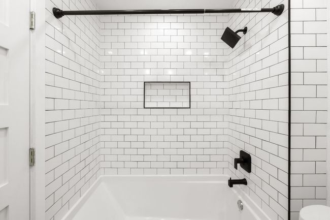 Full bathroom featuring shower / washtub combination and toilet | Image 20