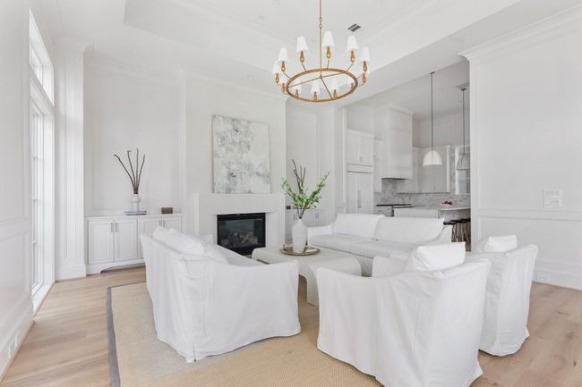 Designed with both cozy nights and lively entertaining in mind, this living space is as functional as it is elegant. | Image 9