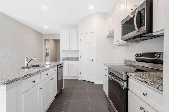 8928 Nuthatcher Dr, House other with 3 bedrooms, 2 bathrooms and null parking in LEESBURG FL | Image 23