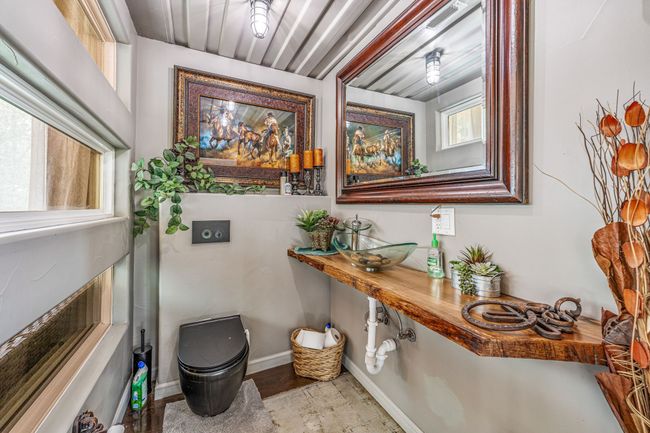 Bathroom with baseboards and a sink | Image 10