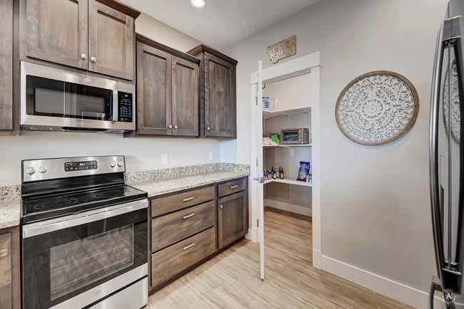Kitchen with Large Pantry | Image 9