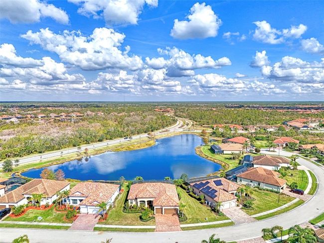 Aerial View of House on Lake | Image 7