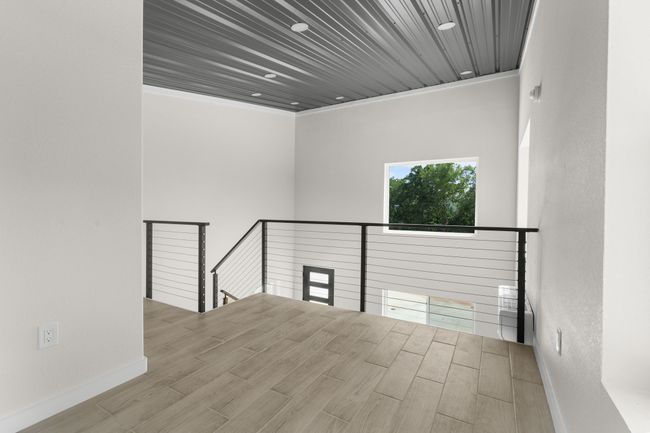 Empty room with baseboards and wood finished floors | Image 18