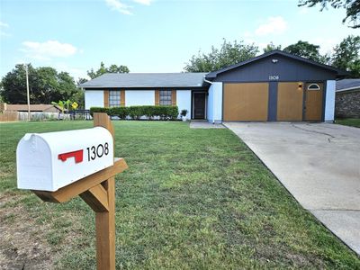 Large Corner Lot with Parking for 4 plus vehicles. | Image 2