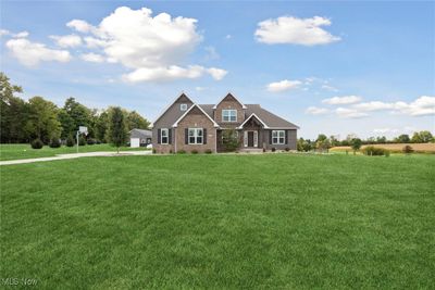 Craftsman house featuring a front yard and a rural view | Image 3