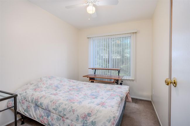 Bedroom featuring carpet floors, a closet, and a ceiling fan | Image 28