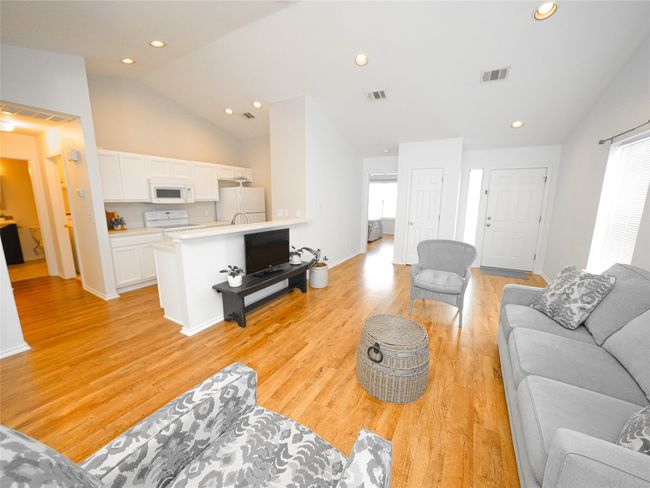 Living area featuring visible vents, recessed lighting, and light wood-type flooring | Image 11