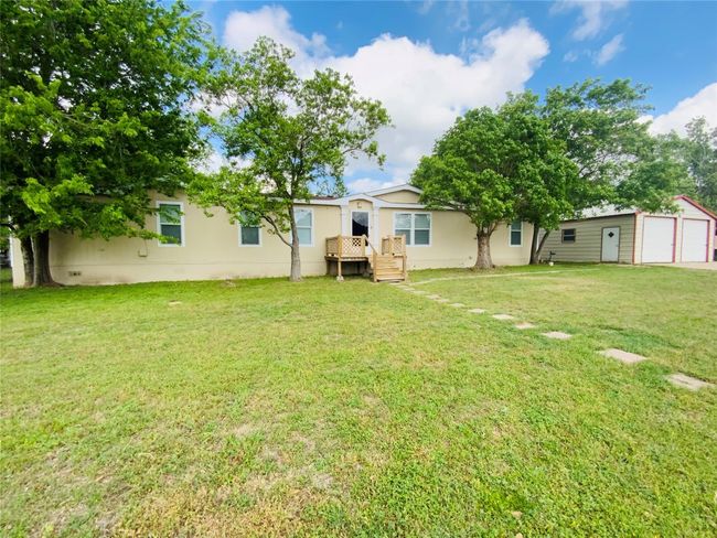 View of yard with a detached garage | Image 4