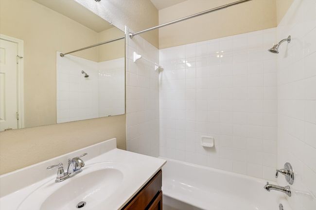Bathroom with shower / bathtub combination and vanity | Image 17