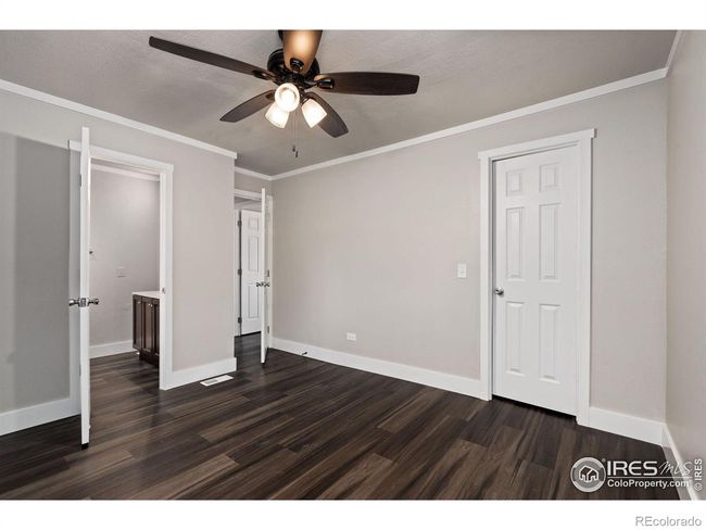 Primary bedroom with walk-in closet and 3/4 bathroom. | Image 17