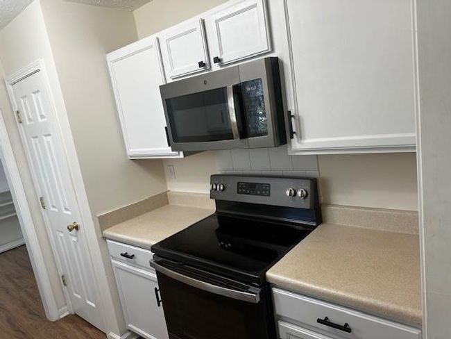 1404 Steam Engine Way Ne, House other with 3 bedrooms, 2 bathrooms and null parking in Conyers GA | Image 4