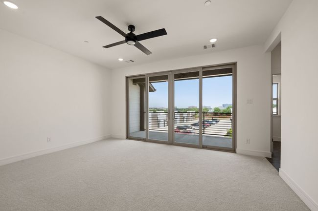 This dream home features a fantastic game room with covered deck! | Image 16
