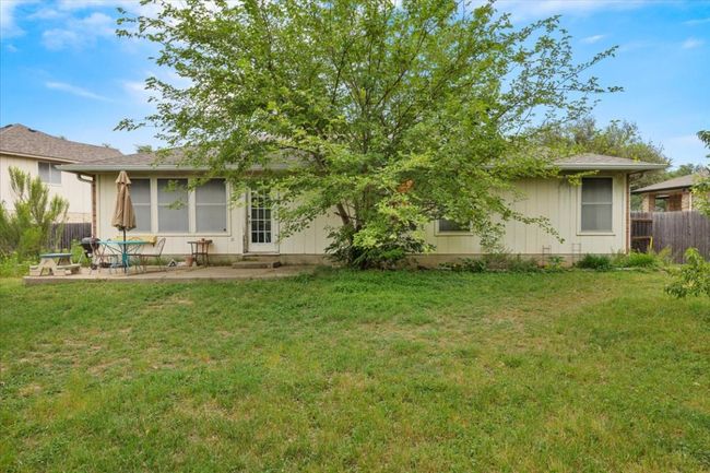 Rear view of house with a patio | Image 31