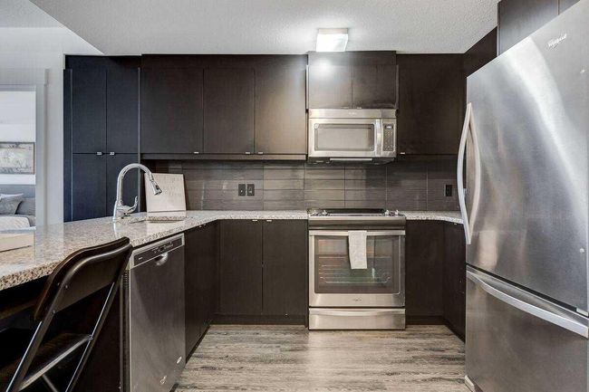 104 - 15 Aspenmont Heights Sw, Home with 2 bedrooms, 2 bathrooms and 1 parking in Calgary AB | Image 7