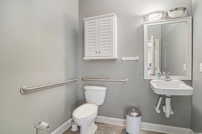 Half bathroom with toilet and​​‌​​​​‌​​‌‌​‌‌​​​‌‌​​‌‌​‌​​​​​‌ baseboards | Image 17