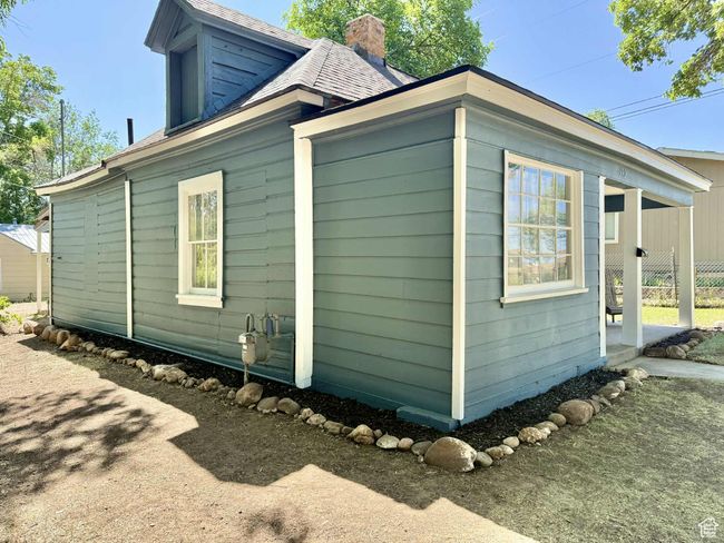 View of side of property with a chimney | Image 6