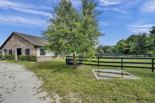 502 Rambling Drive Cir, House other with 5 bedrooms, 3 bathrooms and null parking in Wellington FL | Image 67