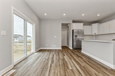 (Photo of similar home, finishes will vary) Next to the kitchen is a dinning area to enjoy meals with family and friends! | Image 3