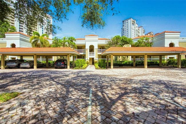 View of home's community with covered parking | Image 6