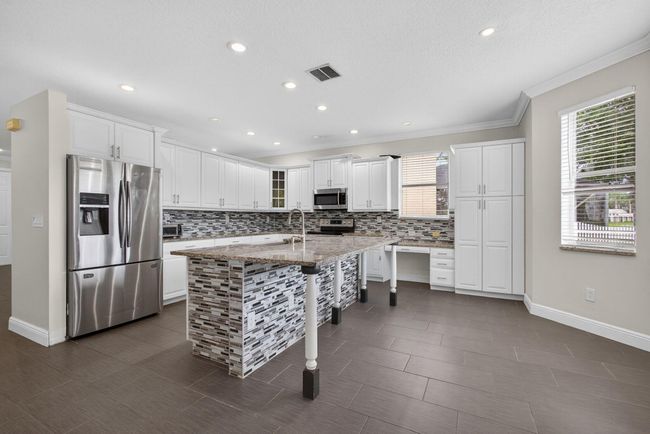 1196 Oakwater Dr, House other with 5 bedrooms, 3 bathrooms and null parking in Royal Palm Beach FL | Image 9