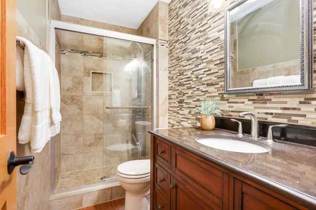 The Primary Suite offers an upgraded private 3/4 bathroom. | Image 17