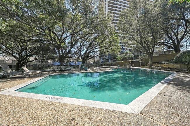 Community pool with a patio | Image 11