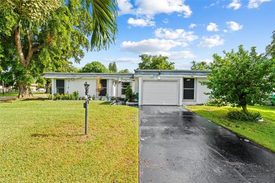 7205 Nw 67th St, House other with 3 bedrooms, 2 bathrooms and null parking in Tamarac FL | Image 1