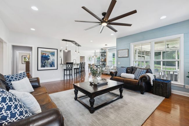 Thoughtfully designed open-concept layout connecting living, dining, and kitchen spaces. | Image 15