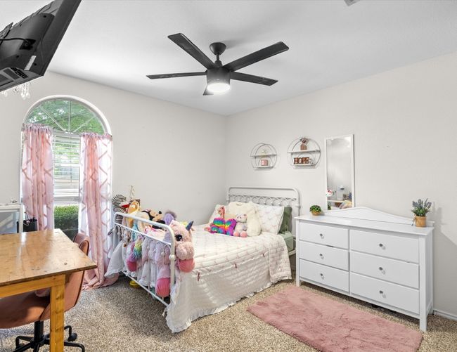 Bedroom featuring carpet flooring and a ceiling fan | Image 22
