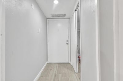 Hallway featuring light hardwood / wood-style floors | Image 2