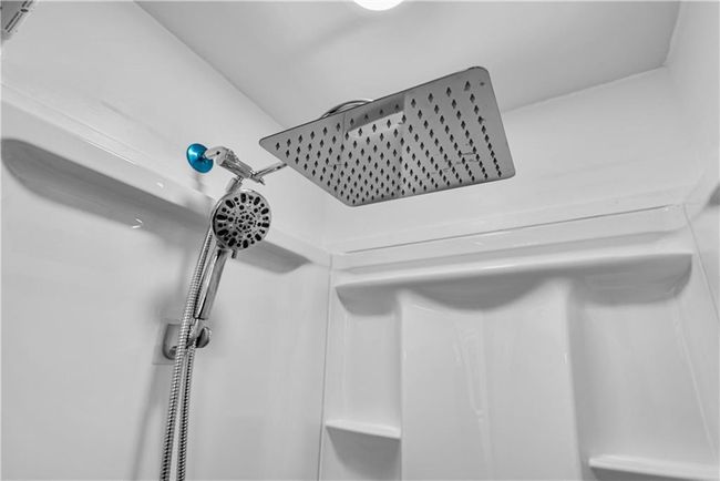 Bathroom view of a shower | Image 43