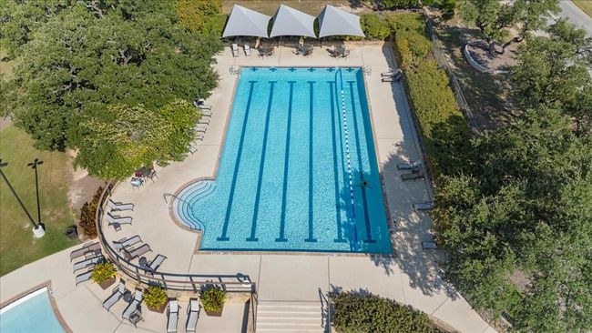 Community pool featuring a patio | Image 34