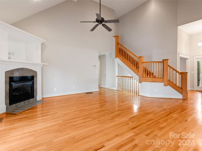 Great room and staircase to upper level 3 bedrooms | Image 6
