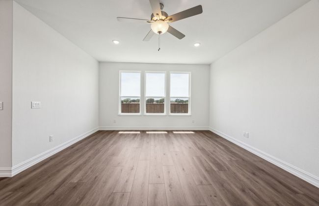 Expansive gathering room bathed in natural sunlight *Real home pictured | Image 7