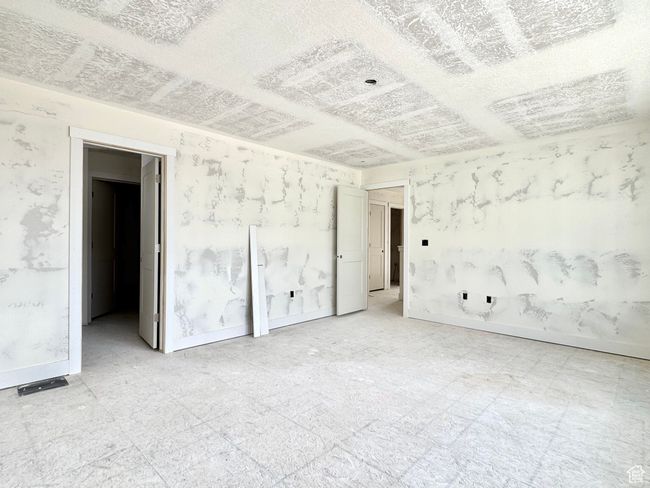 Unfurnished bedroom featuring baseboards | Image 9