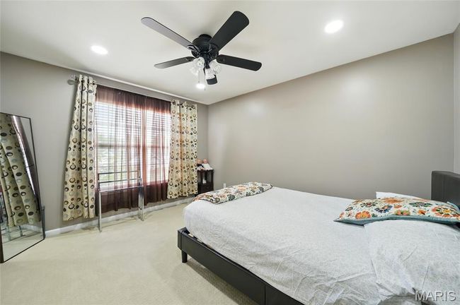 Carpeted bedroom featuring recessed lighting and a ceiling fan | Image 19