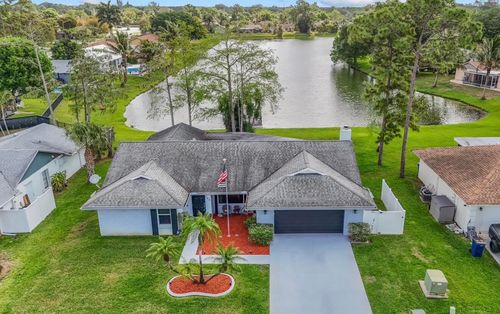 125 Parkwood Dr, Royal Palm Beach, FL, 33411-8204 | Card Image