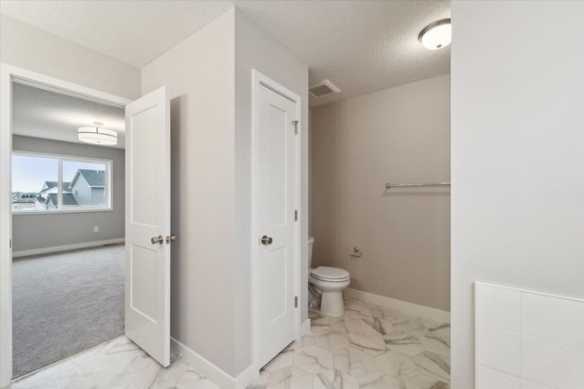 Owner's bath with linen closet. This is not the actual home for sale, but photos of the same floorplan. Additional options may be shown. | Image 13
